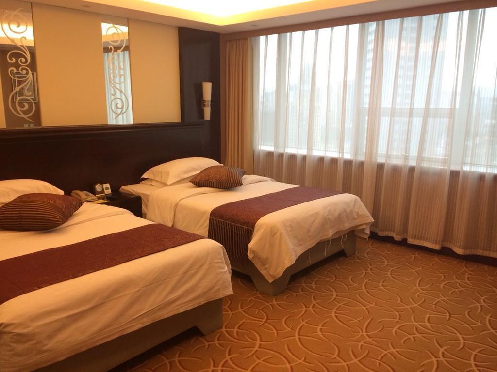 Green Land Hotel Kunming Værelse billede